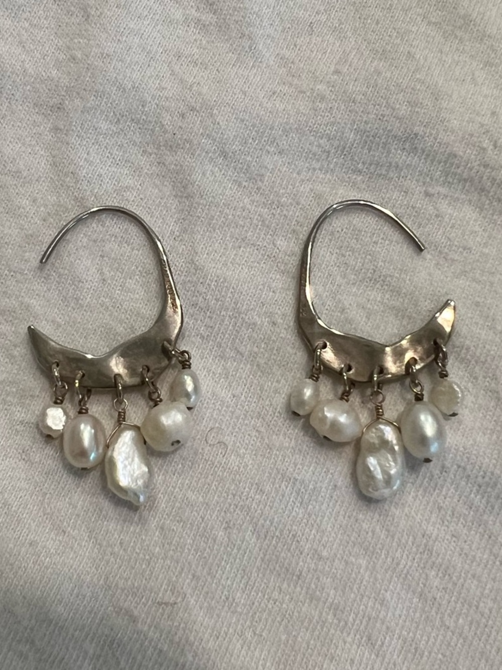 Chan Luu’s Petite Crescent White Pearl and Silver Hoop Earrings
